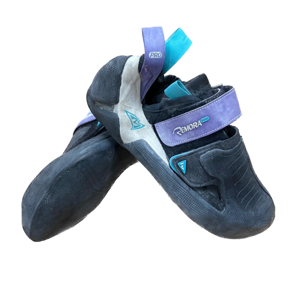 A pair of Remora Pro climbing shoes in black with purple, white and light blue accents.