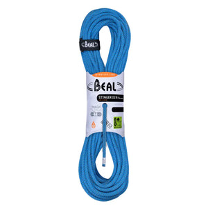 Blue climbing rope with a Beal label on a white background