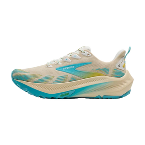 Beige and blue running shoe on a white background