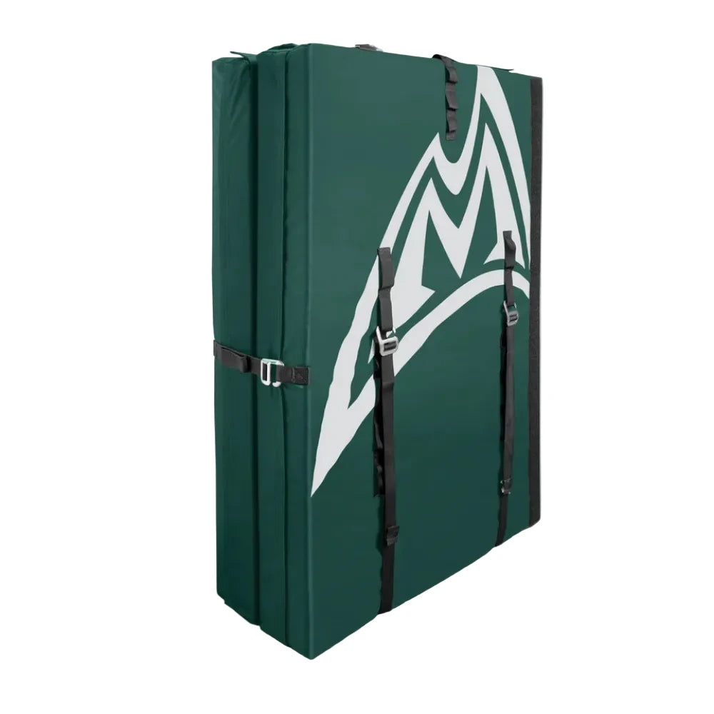 A dark green foam landing pad or gym mat with a white Mad Rock logo on the left side, shown open against a white background.