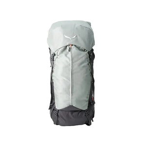 A large hiking backpack shown from the front on a light gray studio background. The backpack has a light sage green top section and a dark charcoal gray bottom section, with a small white stylized logo on the upper front.